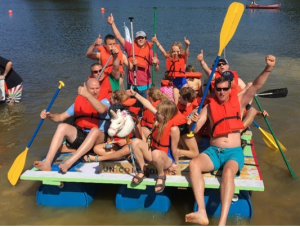 Y guides participates on a homemade raft